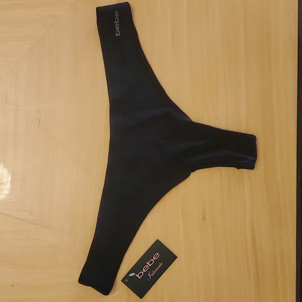 NWT BEBE Black Seamless Thong. Size M